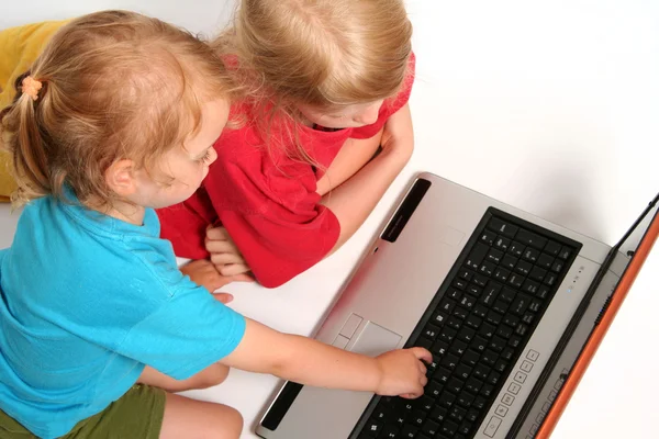 Playing on laptop — Stock Photo, Image