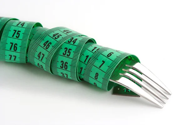 Fork with measuring tape — Stock Photo, Image