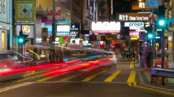 HONG KONG - SEPTEMBER 4, 2012: Street traffic in Hong Kong at night, timelapse. — Stock Video