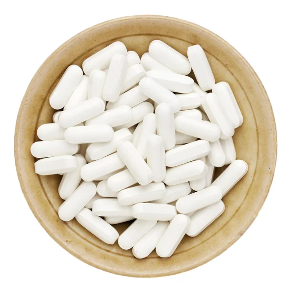 White vitamin pills — Stock Photo, Image