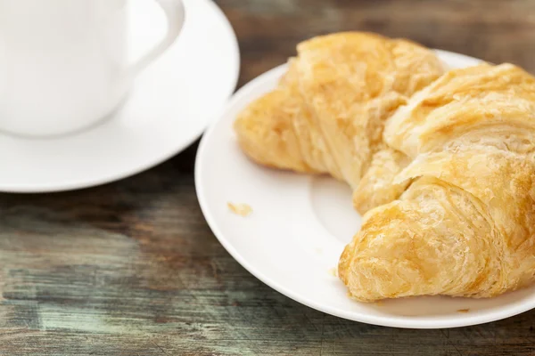 Croissant roll and coffee Royalty Free Stock Photos
