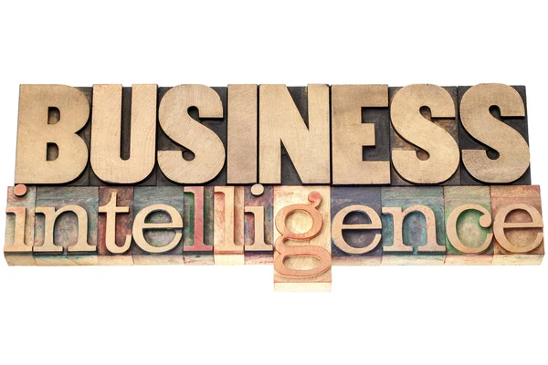 Business intelligence in wood type — Stock Photo, Image