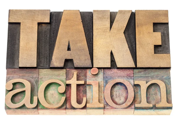 Take action in wood type — Stock Photo, Image