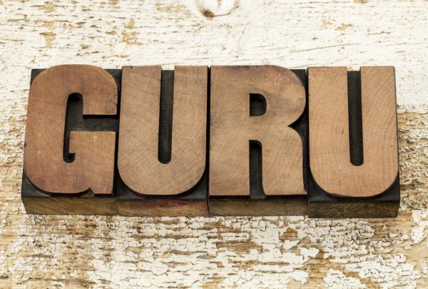 guru word in wood type