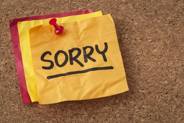 Sorry - apology on sticky note — Stockfoto