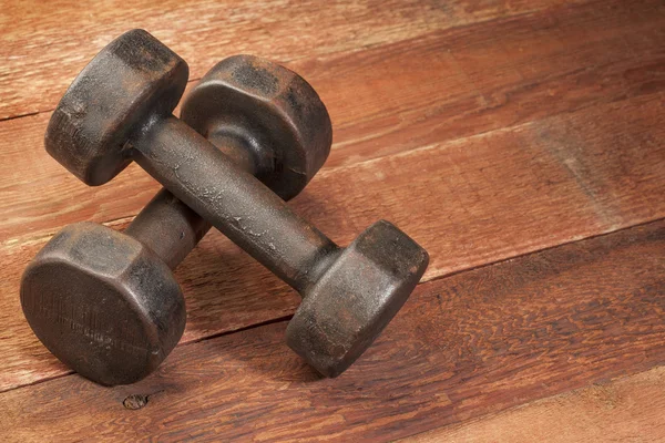 Vintage iron dumbbells — Stock Photo, Image