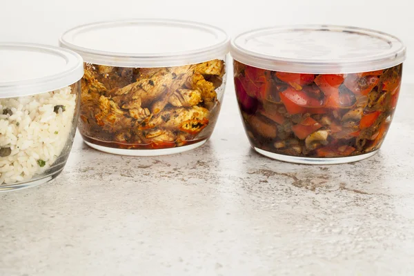 Dinner meal in glass containers — Stock Photo, Image