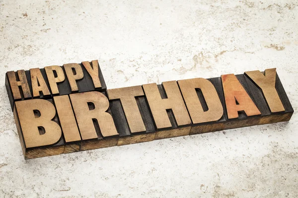 Happy birthday in wood type — Stock Photo, Image