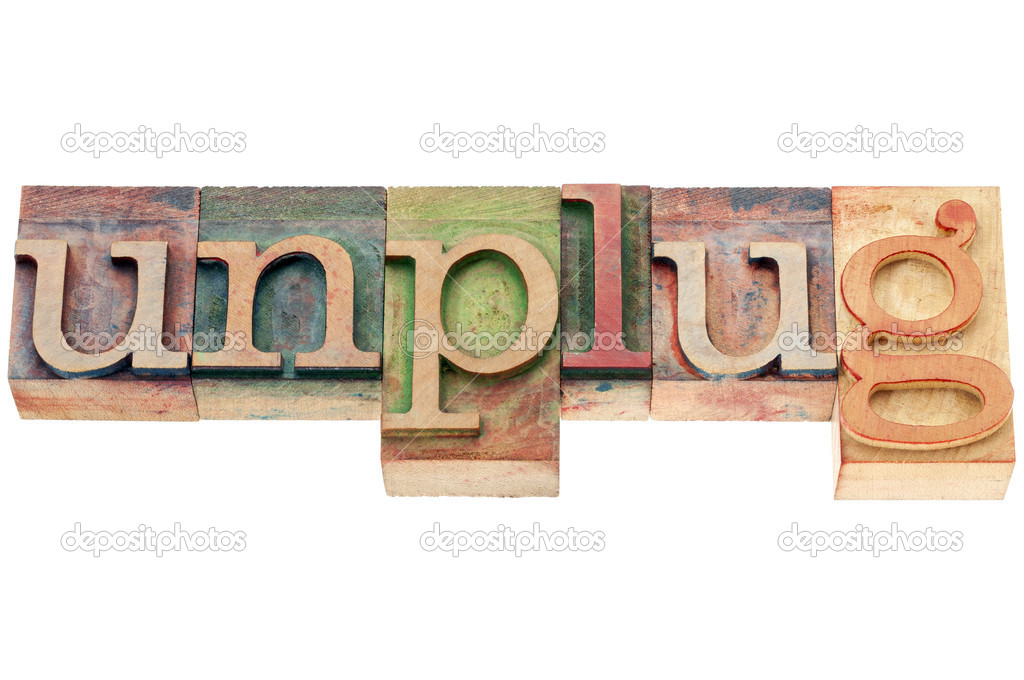 unplug word in wood type
