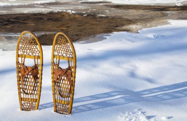 classic Bear Paw snowshoes clipart
