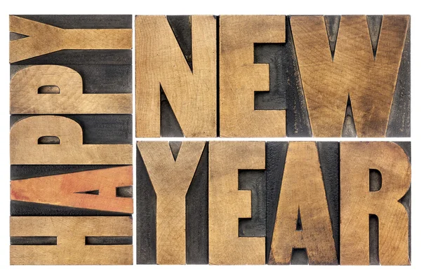 Happy new year in wood type — Stock Photo, Image