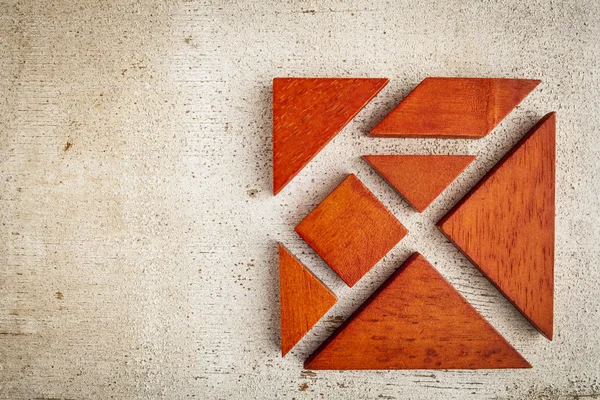 Rompecabezas de madera tangram — Foto de Stock