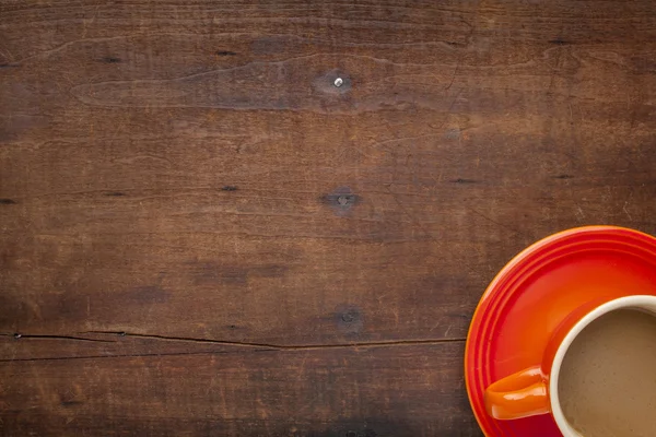 Café en una mesa de madera grunge — Foto de Stock