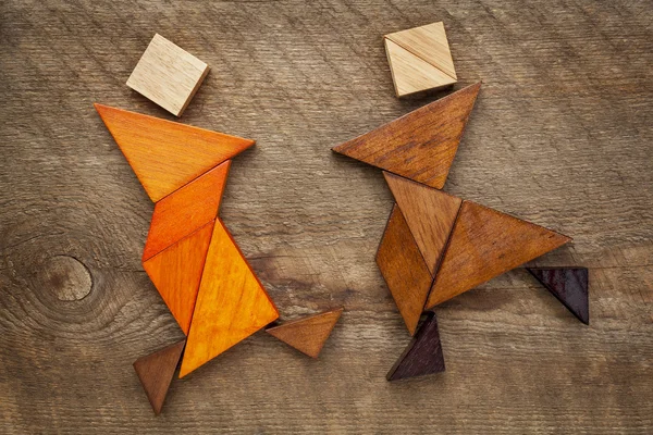 Dancing tangram figures — Stock Photo, Image