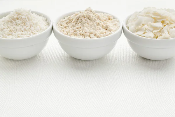 Coconut flour and flakes — Stock Photo, Image