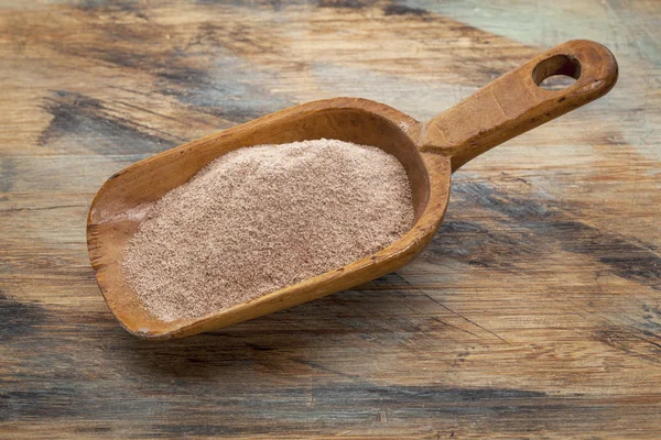 Scoop of teff flour — Stock Photo, Image