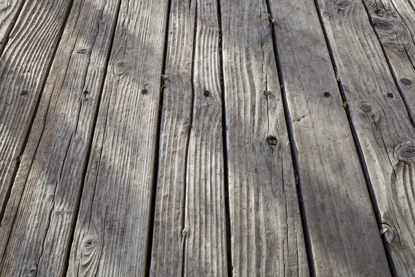 Oude verweerde houten dek — Stockfoto