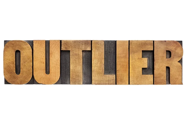 Outlier word in wood type — Stock Photo, Image