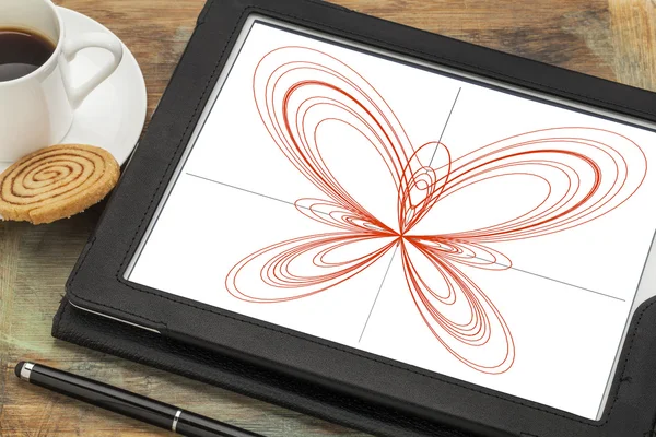 Courbe papillon sur une tablette numérique — Photo