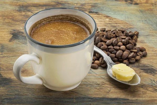 Cup of fatty coffee with butter Stock Photo
