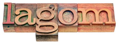 lagom - harf baskısındaki harf bloğunda soyut kelime, İsveç ılımlılığı ve dengeli yaşam tarzı kavramı