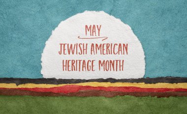 Amerikan Yahudi Mirası Ayı, soyut manzaraya karşı suluboya kağıdın yuvarlak bir sayfasında el yazısı, kültürel olayı hatırlatsın.