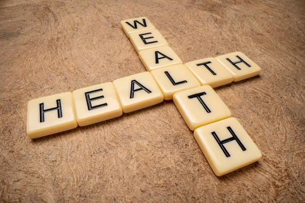 Health Wealth Crossword Ivory Letter Tiles Textured Handmade Paper Wellbeing — Stockfoto