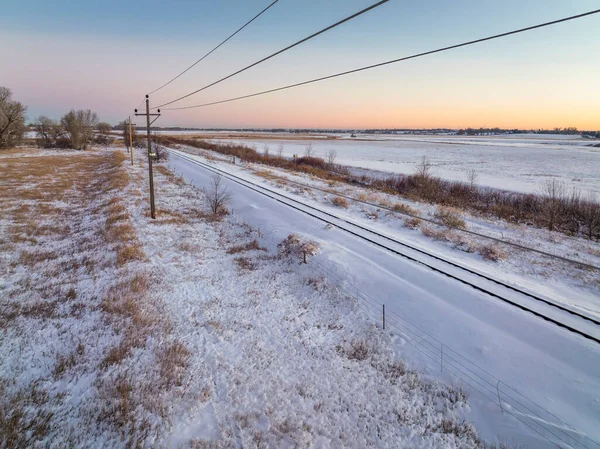 Winter Dusk Colorado Plains Railroad Tracks Power Line Irrigation Ditch — Stok fotoğraf