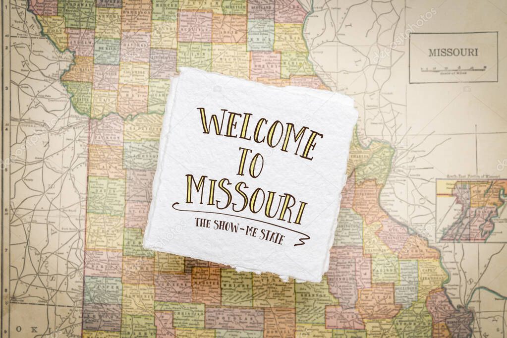 welcome to Missouri, the show-me state - handwriting on a square sheet of rough handmade paper floating over vintage defocused map of Missouri