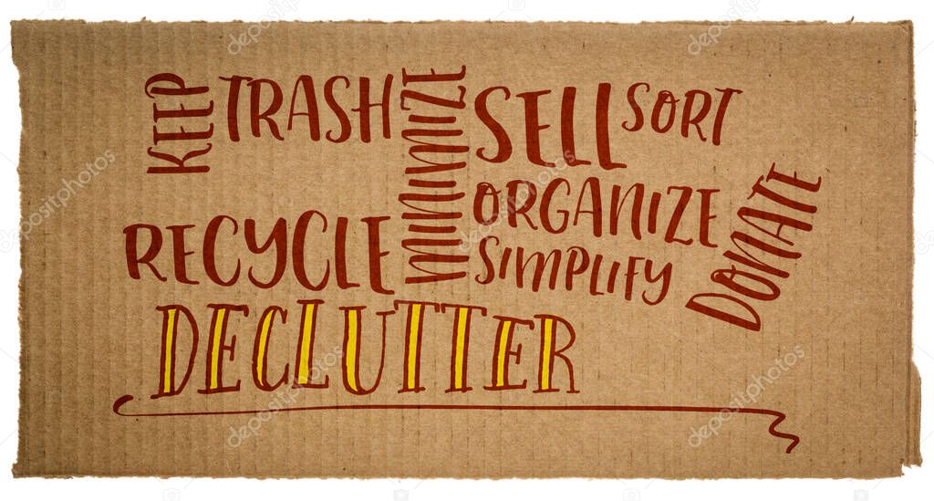 declutter and simplify  word cloud - handwriting on a carboard isolated on white
