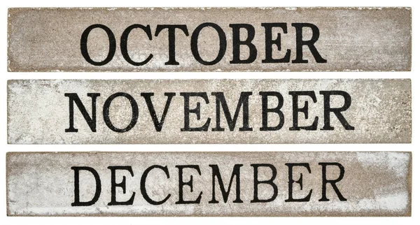 10月 11月和12月 关于用白色隔断的黑色木块的粗体文字 — 图库照片