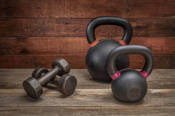 Iron Kettlebells Pair Dumbbells Rustic Wood Background Exercise Fitness Concept — Stock Photo, Image