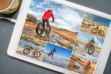 Colorado eteklerinde ve çayırlarda bisiklet sürerken çekilen şişman bisiklet resimlerine bakıyorum. Dijital tablet üzerinde aynı son sınıf bisikletçi. Fotoğrafçı tarafından tüm ekran resimleri telif hakkı.