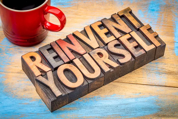 Reinvent Yourself Motivational Words Vintage Letterpress Wood Type Grunge Painted — Stock Photo, Image