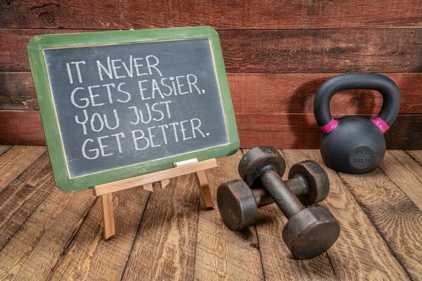 Never Gets Easier You Just Get Better Inspirational Slogan Slate — Stock Photo, Image