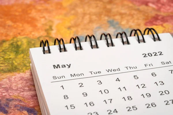 May 2022 Spiral Desktop Calendar Textured Handmade Paper Low Angle — Stock Photo, Image