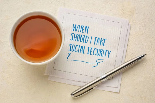 Should Take Social Security Retirement Finance Planning Question Handwriting Napkin — Fotografia de Stock