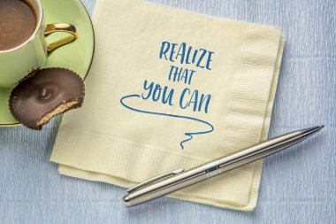 realize that you can - inspirational reminder note on a napkin with a cup of coffee, positive attitude and mindset concept