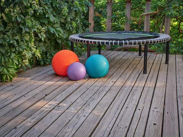 Three Heavy Slam Balls Filled Sand Mini Trampoline Backyard Deck — Stockfoto