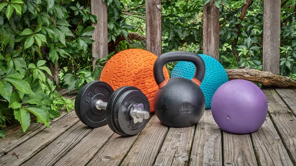 Three Heavy Slam Balls Iron Kettlebell Dumbbell Backyard Deck Home —  Fotos de Stock