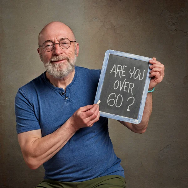 You Question White Chalk Slate Blackboard Held Smiling Senior Male — Stock fotografie