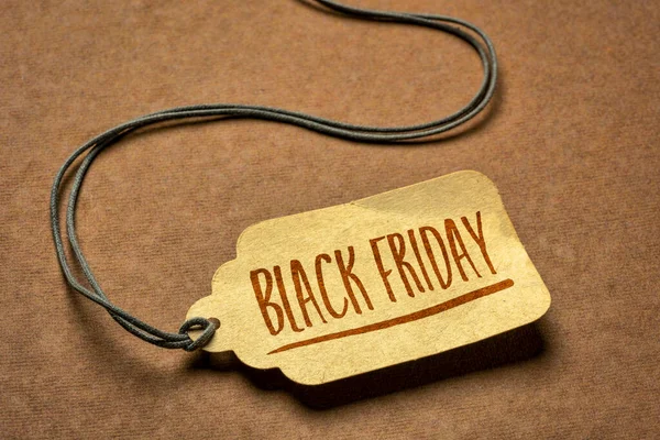 Black Friday Zeichen Ein Papierpreisschild Mit Einem Zwirn Gegen Texturpapier — Stockfoto
