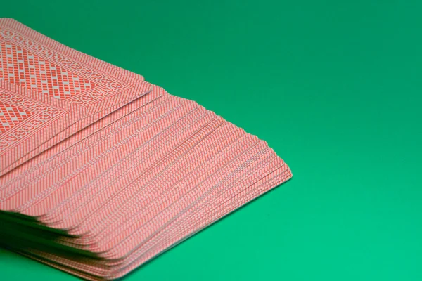 Deck of poker cards on green table — Stock Photo, Image