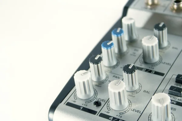 Small sound mixer and preamp on white background Stock Picture