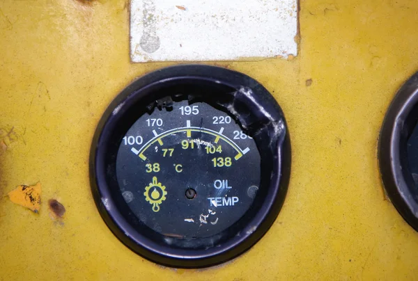 Dashboard of an old abandoned industrial vehicle — Stock Photo, Image