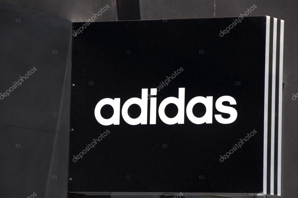white adidas sign