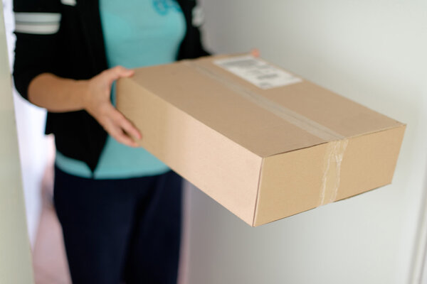 Woman receiving parcel