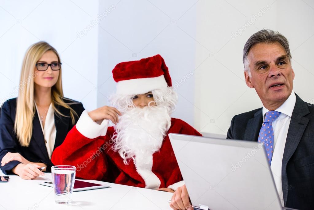 Santa Claus in business meeting