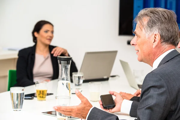 Mixed group in business meeting — Stock Photo, Image