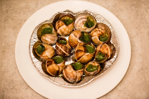 Close up de Escargots com manteiga de alho — Fotografia de Stock